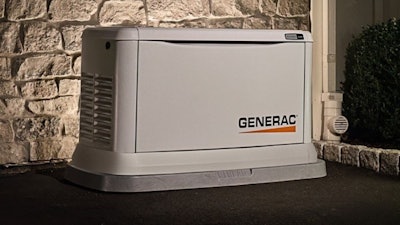 A Generac generator outside a house.