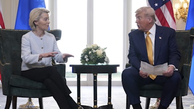 President Donald Trump and European Commission President Ursula von der Leyen talk after reaching a trade deal at the Trump Turnberry golf course in Turnberry, Scotland Sunday, July 27, 2025.