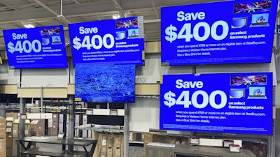 Flat screen TVs displayed at a retail store in Vernon Hills, Ill., Aug. 7, 2025.