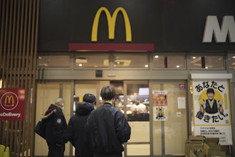 People stands outside a McDonald's store in Tokyo, March 15, 2024.