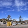 Mine shafts 10, left, and 9, right, tower over the Resolution Copper Mining Company facility, June 9, 2023, in Miami, Ariz.