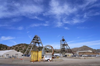 Mine shafts 10, left, and 9, right, tower over the Resolution Copper Mining Company facility, June 9, 2023, in Miami, Ariz.