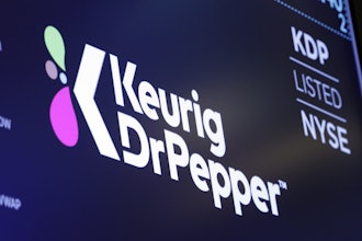 The logo for Keurig Dr. Pepper appears above a trading post on the floor of the New York Stock Exchange, July 12, 2018.