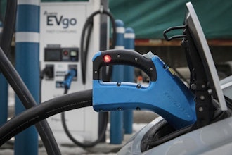 In this photo provided by VTDigger, an electric vehicle is seen plugged into a fast charger in Rutland, Vt., Feb. 17, 2022.