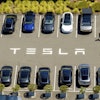 Tesla vehicles line a parking area at the company's Fremont, Calif., factory on Tuesday, Aug. 5, 2025.