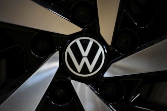 The logo of German car manufacturer Volkswagen is pictured at Volkswagen's transparent factory in Dresden, Germany, on May 14, 2025.