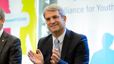 Laurent Freixe applauds during an event in Vevey, Switzerland, Sept. 18, 2014.