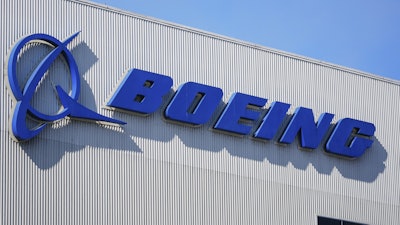 The Boeing logo is displayed at the company's factory, Sept. 24, 2024, in Renton, Wash.