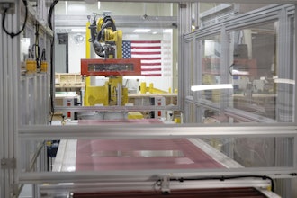 Lengths of glass move down a quality control line during a tour of Corning's iPhone glass manufacturing facility Friday, Sept. 12, 2025, in Harrodsburg, Ky.