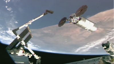 This image provided by NASA shows Northrop Grumman's newly arrived cargo capsule at the International Space Station on Thursday, Sept. 18, 2025.