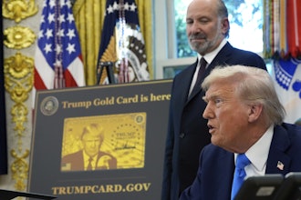 President Donald Trump speaks as Commerce Secretary Howard Lutnick listens in the Oval Office of the White House, Friday, Sept. 19, 2025, in Washington.