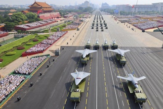 In this photo released by Xinhua News Agency, drones and other armament formations pass during the military parade to commemorate the 80th anniversary of the end of World War II held in front of Tiananmen Gate in Beijing, Wednesday, Sept. 3, 2025.