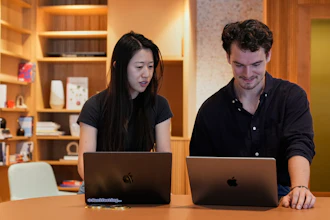 Claude code product manager Cat Wu, left, and Alex Albert, head of Claude relations, work inside Anthropic headquarters in San Francisco, Wednesday, Aug. 27, 2025.