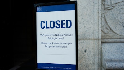 A closed sign stands in front of the National Archives on the first day of a government shutdown, Wednesday, Oct. 1, 2025, in Washington.