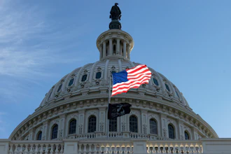The American flag over the Capitol in Washington, Oct. 1, 2025.