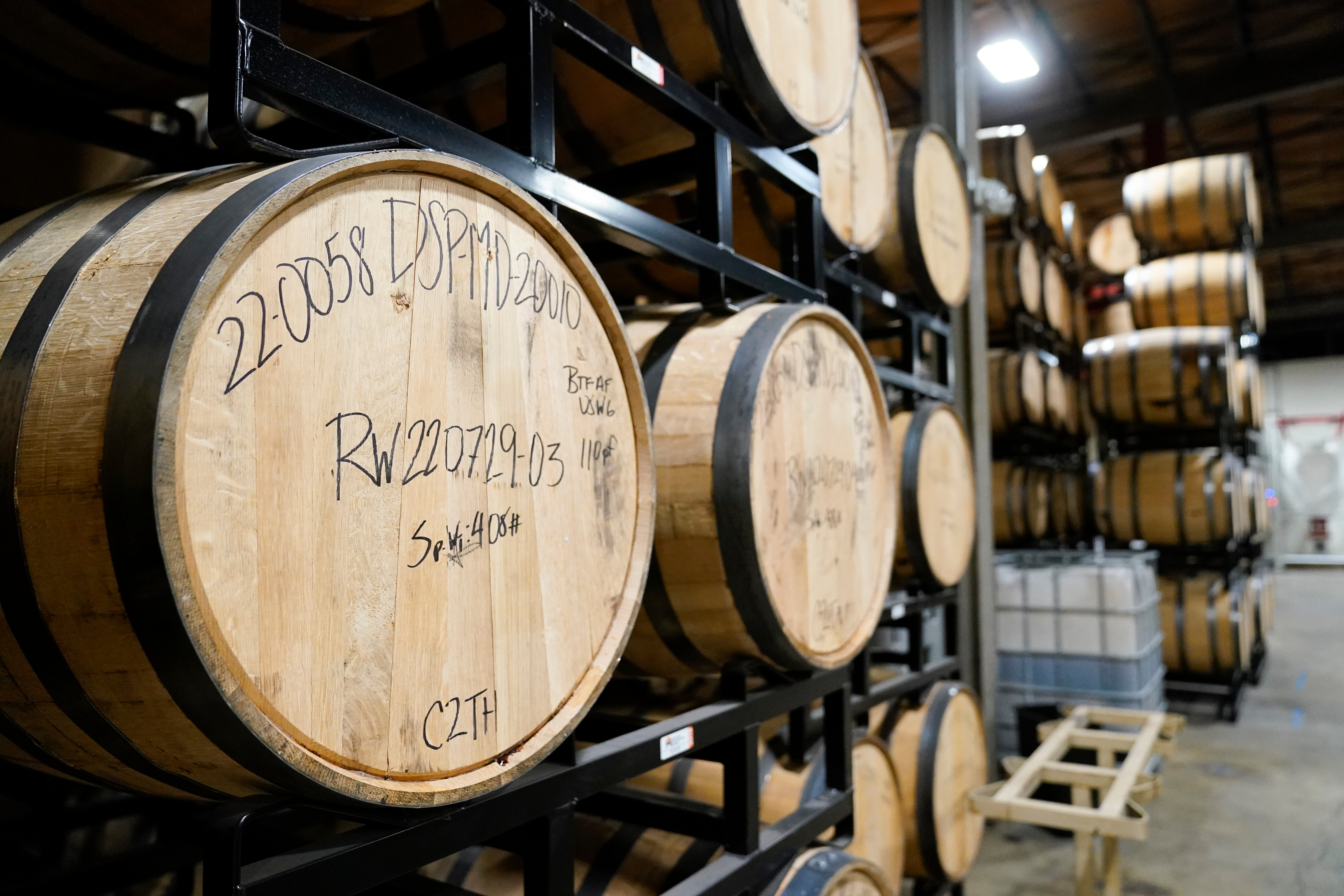 Barrels of spirits are seen at the Baltimore Spirits Company distillery, Feb. 8, 2023, in Baltimore.