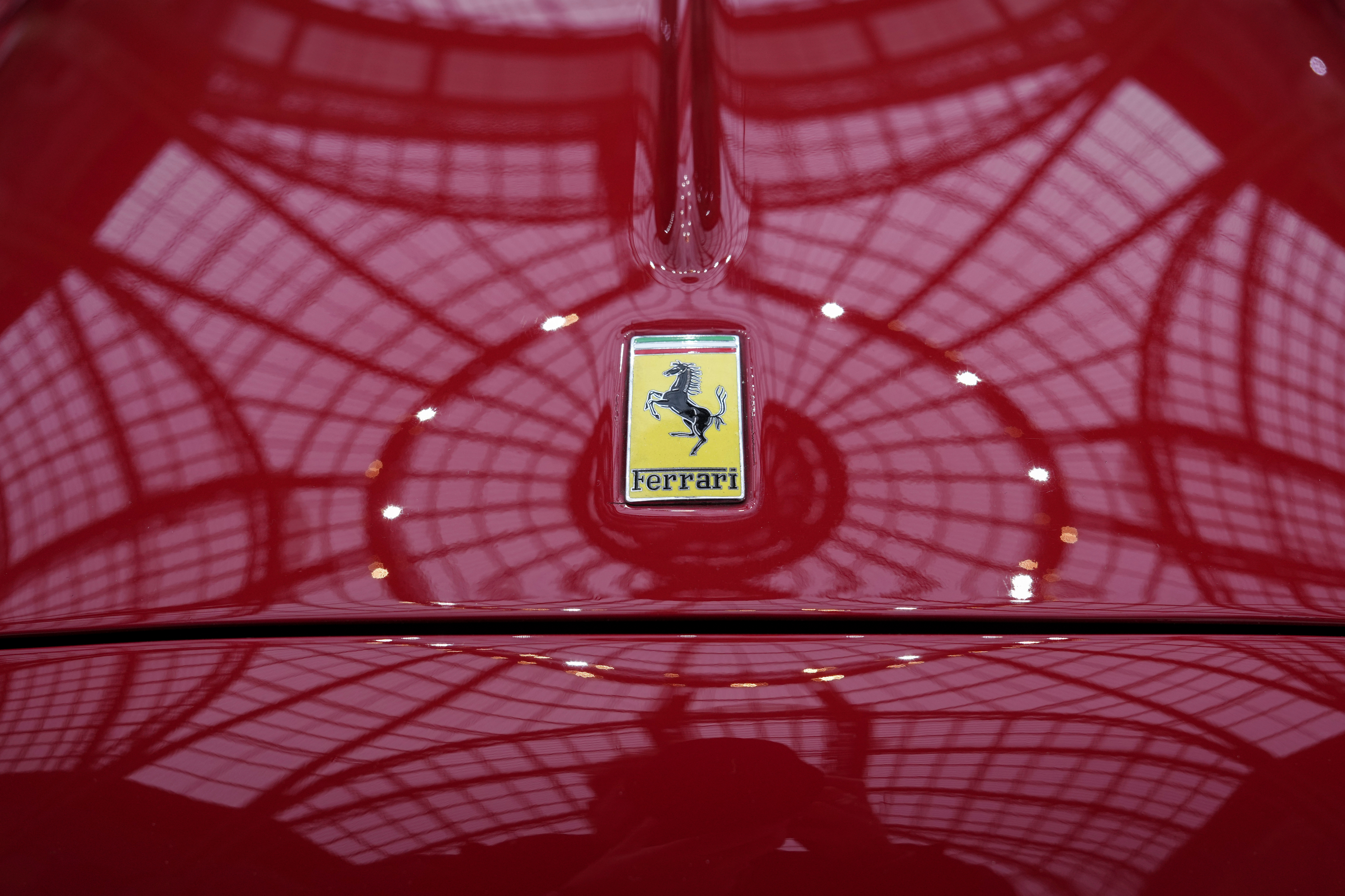 The Ferrari logo is photographed on a 1950 Oldsmobile Ferrari 166 MM Touring Barchetta displayed at the Grand Palais in Paris, Tuesday, Feb. 4, 2025.