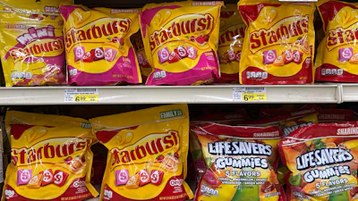 Starburst candy are displayed on a shelve at a grocery store in Mount Prospect, Ill., Monday, Oct. 20, 2025.