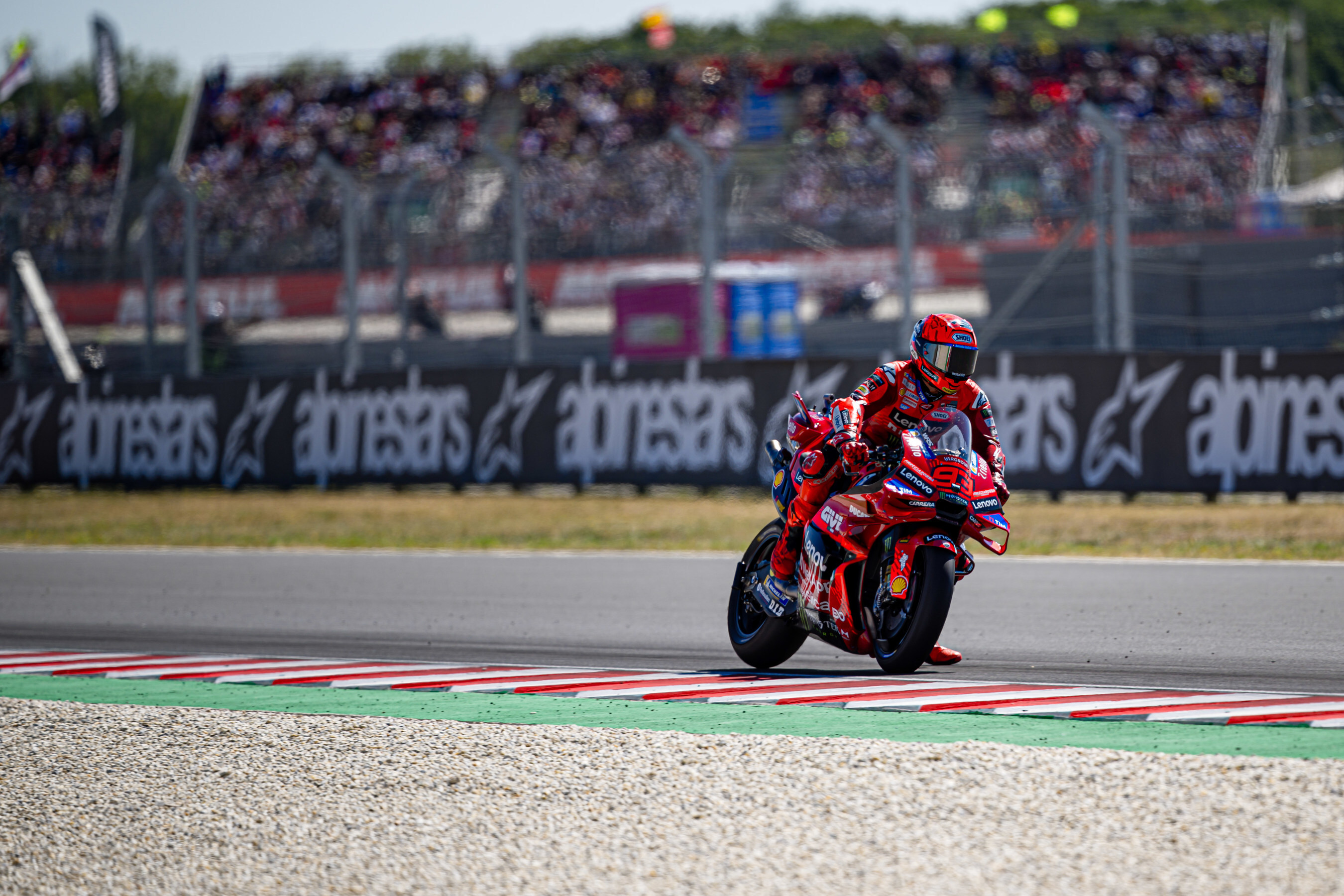 A Ducati model on the MotoGP track.