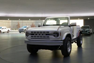 In this image taken from video, a Bronco concept vehicle is parked in the showroom inside Ford Motor Co.'s new headquarters building, Monday, Nov. 10, 2025, in Dearborn, Mich.