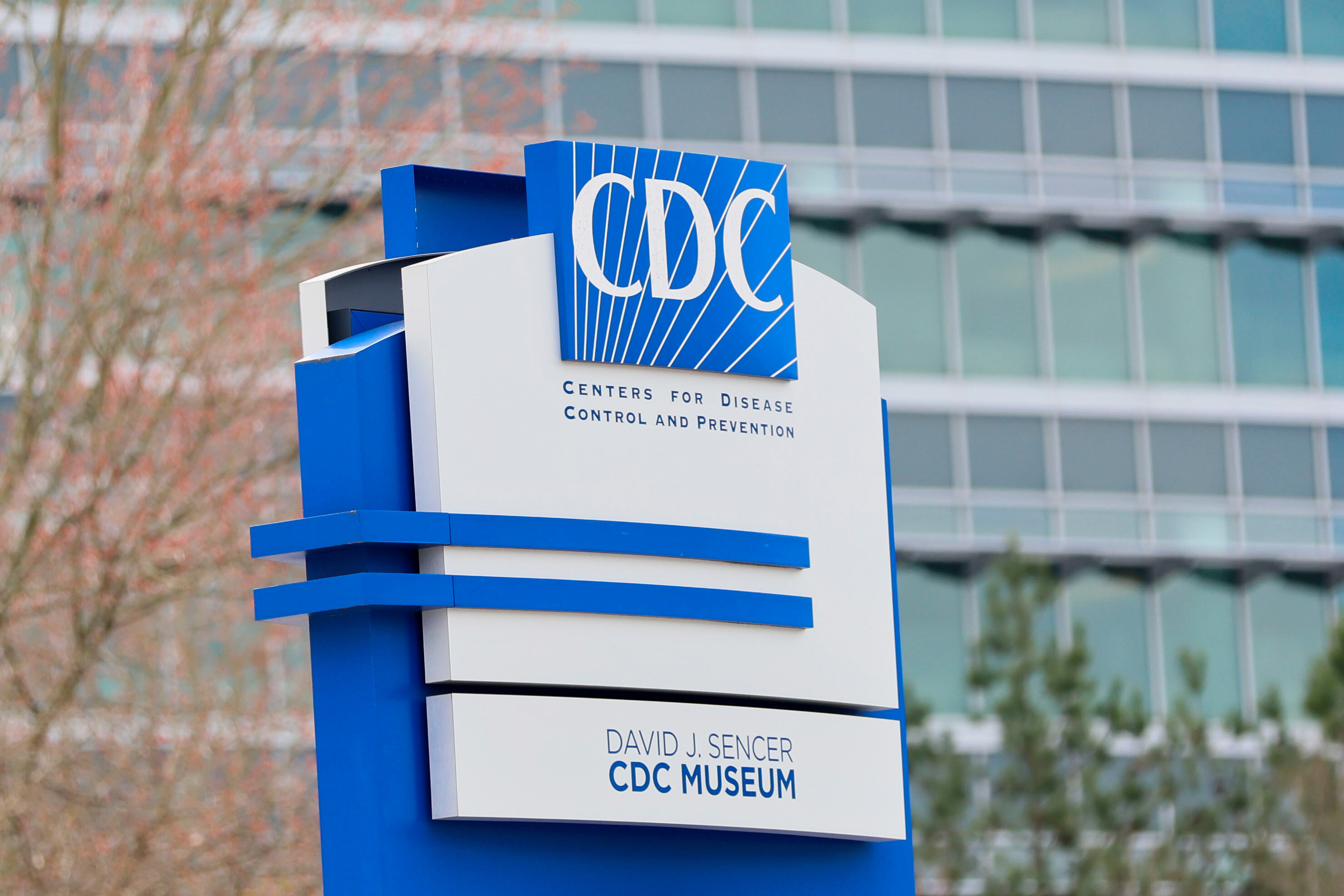 A sign with the CDC logo is displayed at the entrance to the agency's headquarters in Atlanta on March 2, 2025.