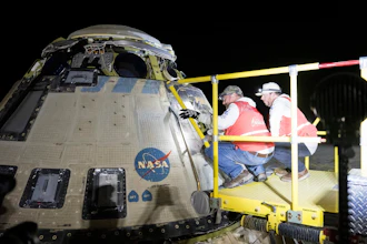 In this photo provided by NASA, Boeing and NASA teams work around NASA's Boeing Crew Flight Test Starliner spacecraft after it landed uncrewed, Sept. 6, 2024, at White Sands, New Mexico, after undocking from the International Space Station.
