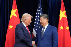 President Donald Trump, left, and Chinese President Xi Jinping, right, shake hands before their meeting at Gimhae International Airport in Busan, South Korea, Thursday, Oct. 30, 2025.
