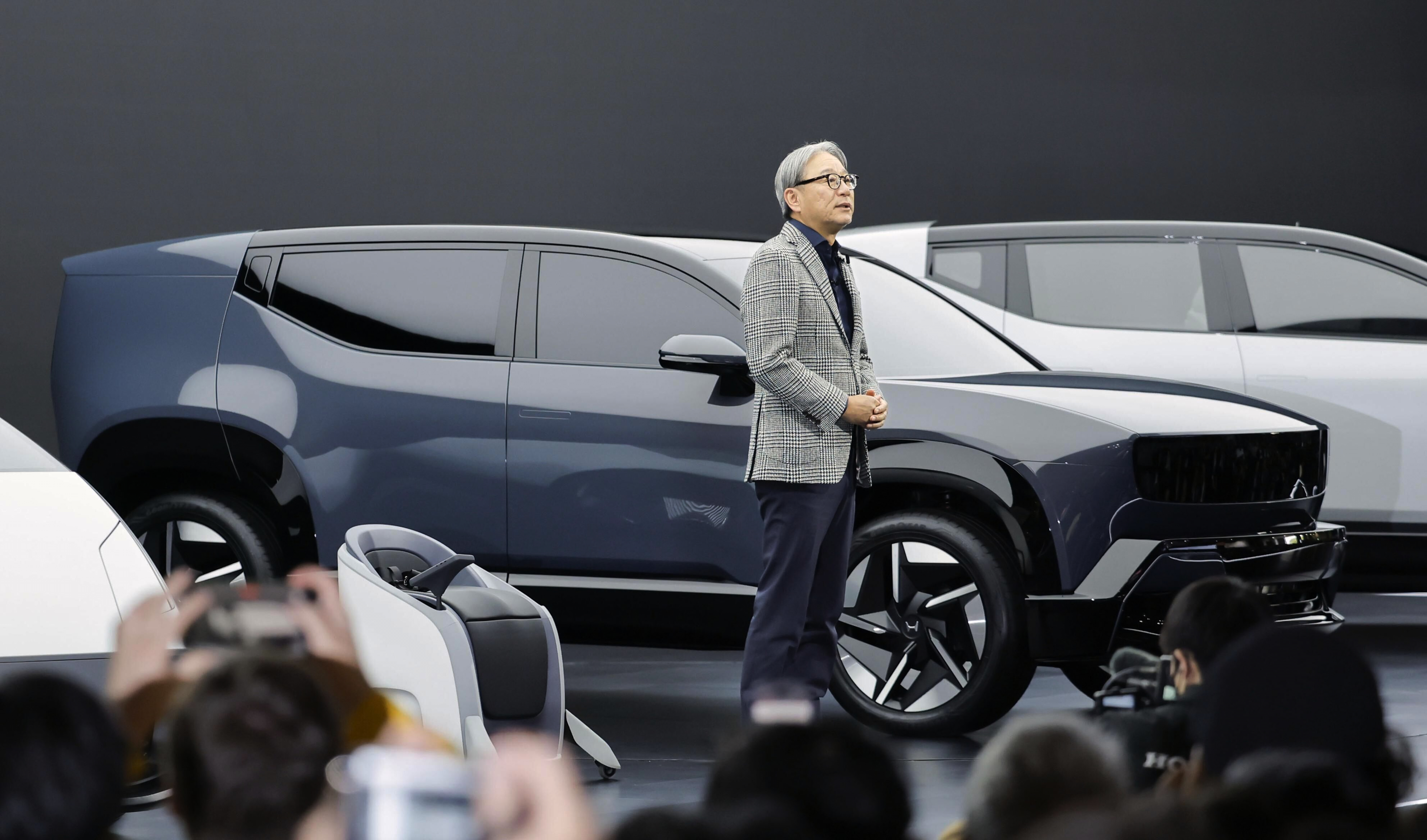Honda Chief Executive Toshihiro Mibe speaks to the media at Tokyo Mobility Show during a media day at Tokyo Big Sight in Tokyo, on Wednesday, Oct. 29, 2025.