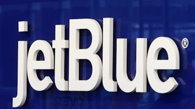 The JetBlue logo is seen at the check-in counter at the Richmond International Airport in Sandston, Va., Oct. 17, 2019.