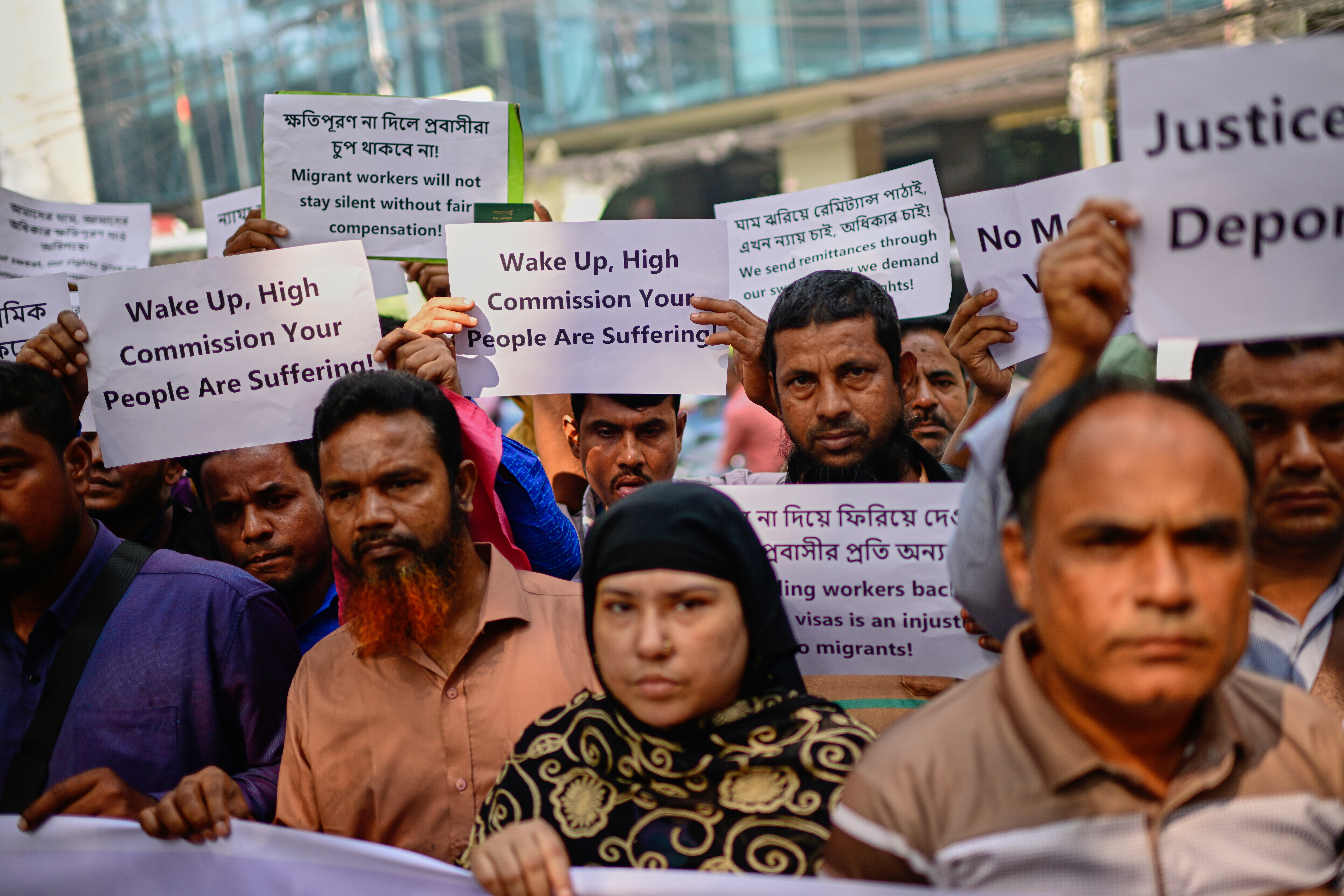 Bangladeshi workers who were employed by Malaysian companies protest in front of the Ministry of Expatriates' Welfare and Overseas Employment demanding unpaid wages, fair compensation and an end to alleged abuse by Malaysian employers, in Dhaka, Bangladesh, Monday, Nov. 10, 2025.