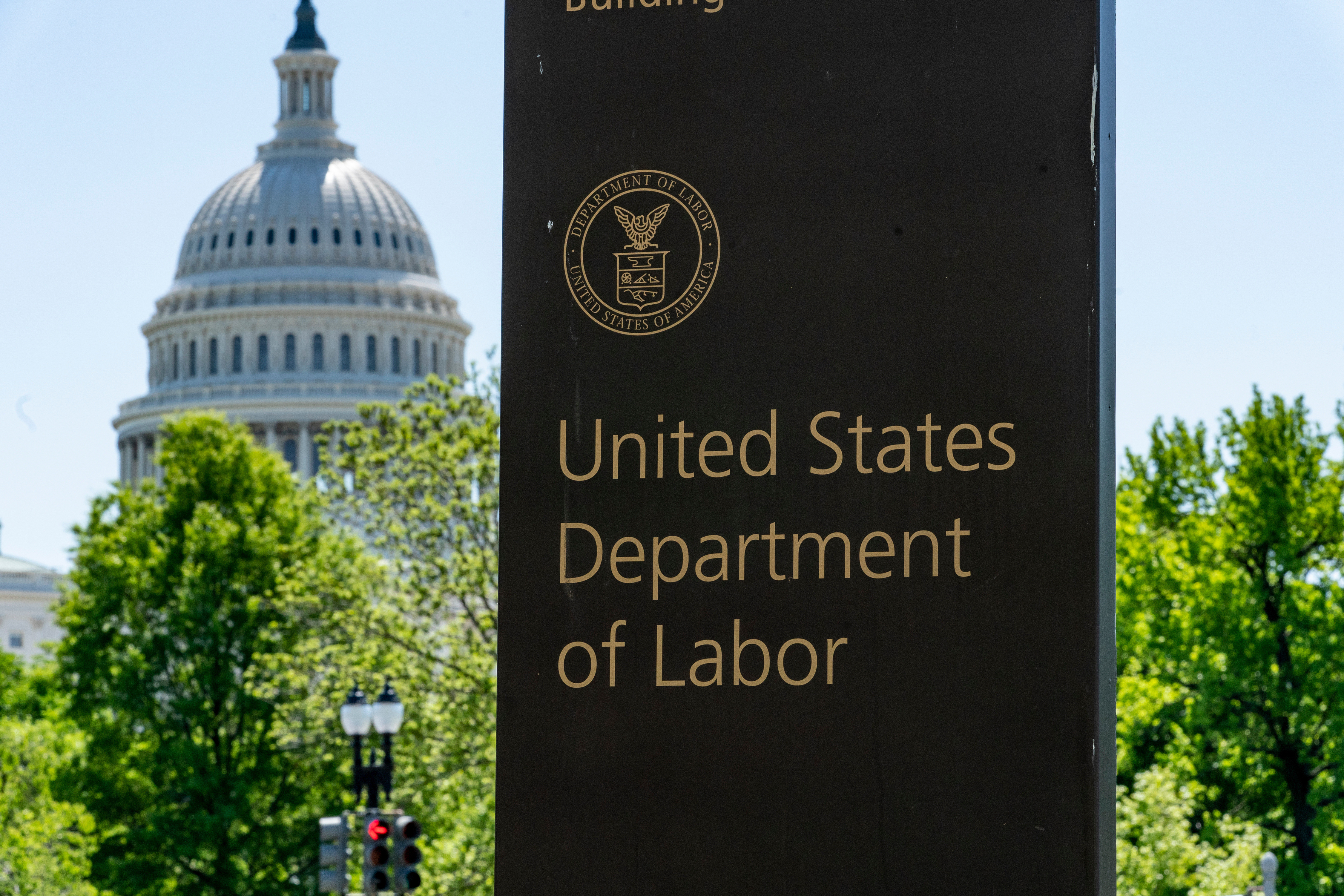 In this May 7, 2020, file photo, the entrance to the Labor Department is seen near the Capitol in Washington.