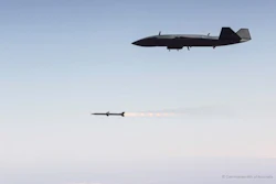An MQ-28 Ghost Bat fires an AIM-120 missile to successfully demonstrate a force integrated air-to-air autonomous weapon engagement.