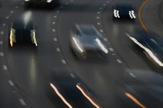 Vehicles drive along a highway July 30, 2025, in Cincinnati.