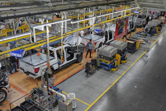 Employees work on the assembly line at the Ford River Rogue complex, Tuesday, Jan. 13, 2026, in Dearborn, Mich.