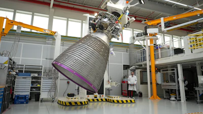 A mechanic works on the Vulcain 2.1 engine that powers the Ariane 64 rocket, at the ArianeGroup's plant in Vernon, west of Paris, Wednesday, Feb. 4, 2026.