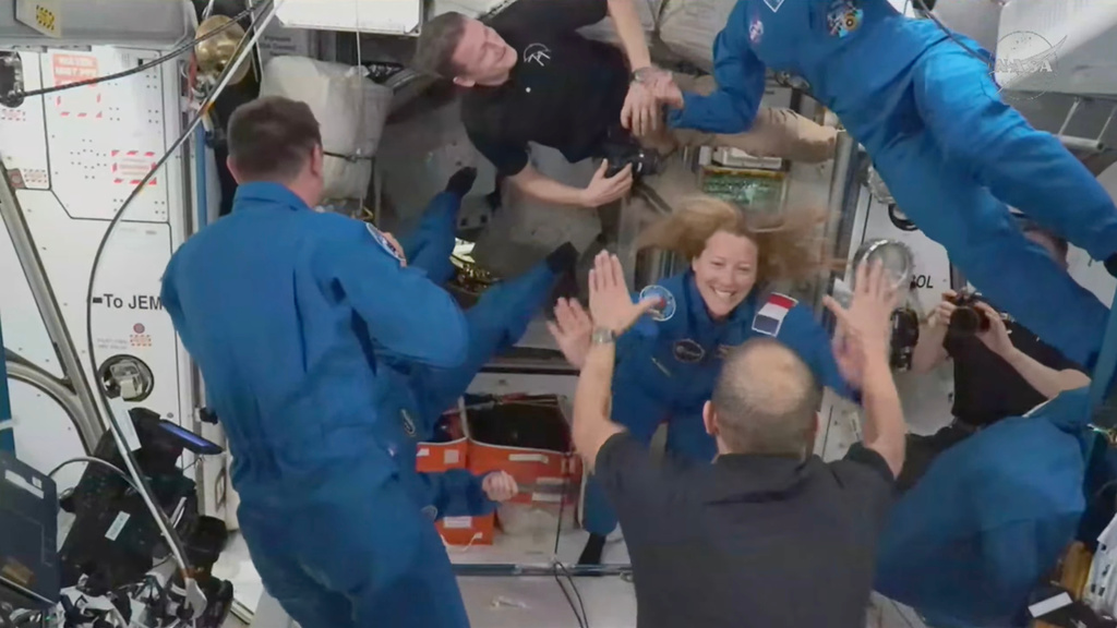 In this image from video provided by NASA, France&rsquo;s Sophie Adenot, Russia&rsquo;s Andrei Fedyaev and Americans Jessica Meir and Jack Hathaway greet colleagues as they enter the International Space Station after arriving on a SpaceX Dragon capsule on Saturday, Feb. 14, 2026.