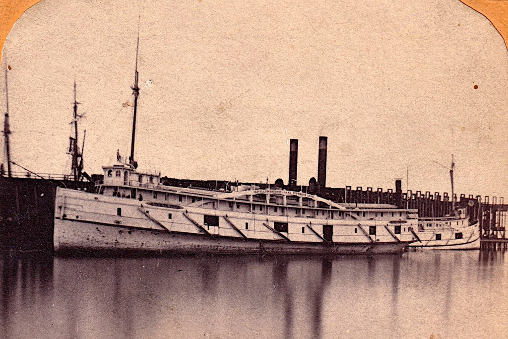 This image of an original photo print provided by Brendon Baillod shows the Lac La Belle docked at Marquette, Mich., in 1866.
