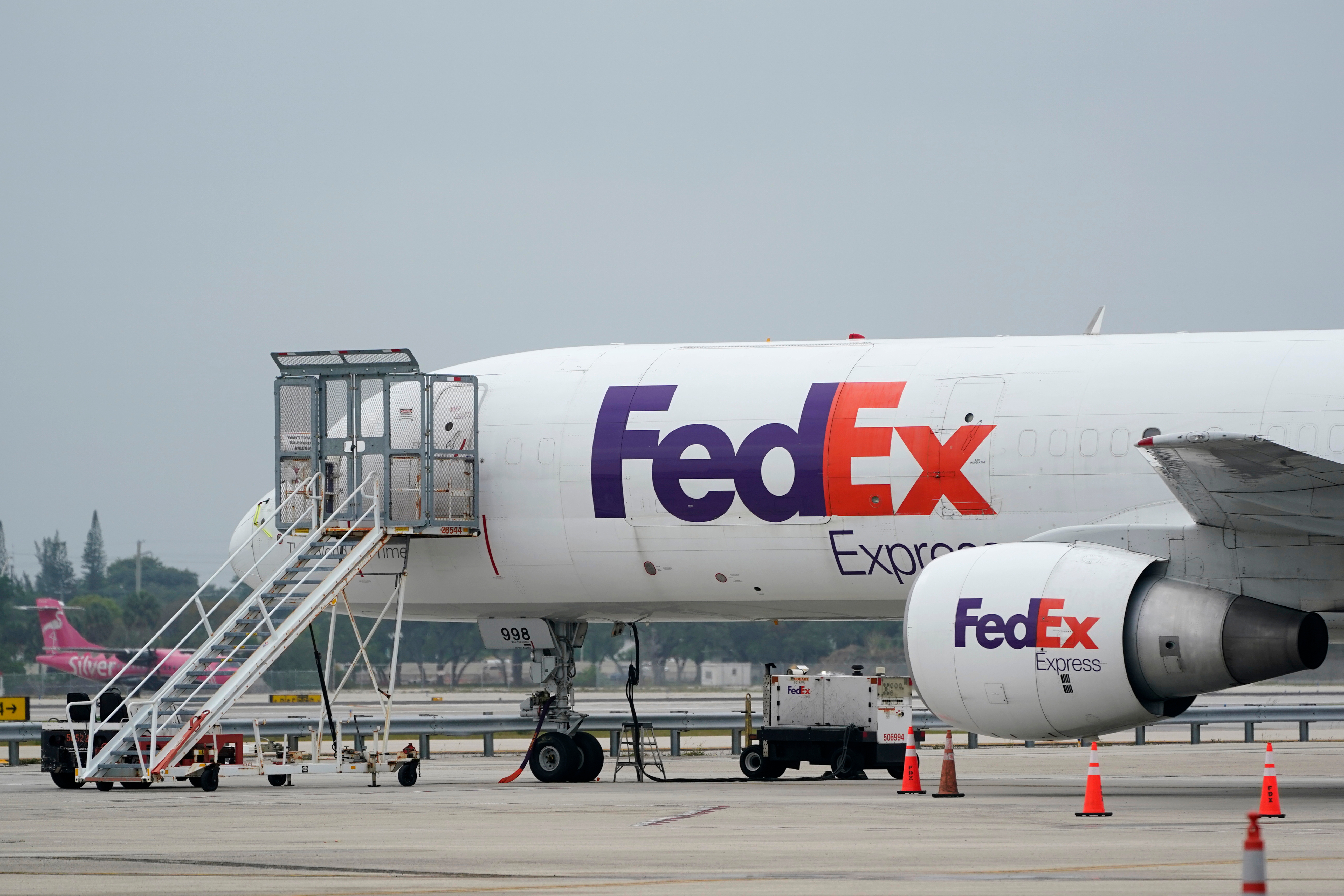 A FedEx cargo plane is shown on the tarmac at Fort Lauderdale-Hollywood International Airport, Tuesday, April 20, 2021, in Fort Lauderdale, Fla.