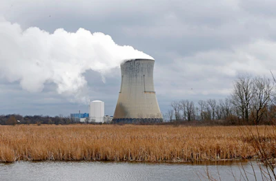 Plumes of steam drift from the cooling tower of FirstEnergy Corp.'s Davis-Besse Nuclear Power Station in Oak Harbor, Ohio, April 4, 2017.