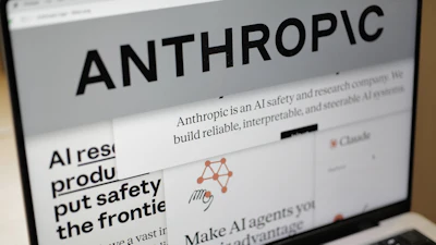 Pages from the Anthropic website and the company's logo are displayed on a computer screen in New York, Feb. 26, 2026.