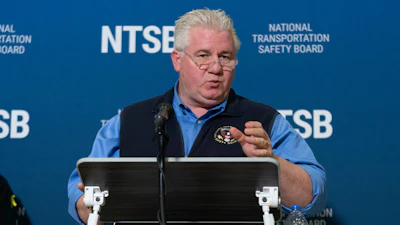 National Transportation Safety Board member Todd Inman speaks with reporters at Ronald Reagan Washington National Airport, Feb. 1, 2025, in Arlington, Va.