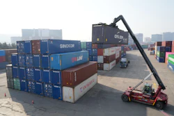 A crane unloads a container at the Uiwang ICD Terminal in Uiwang, South Korea, Thursday, March 12, 2026.