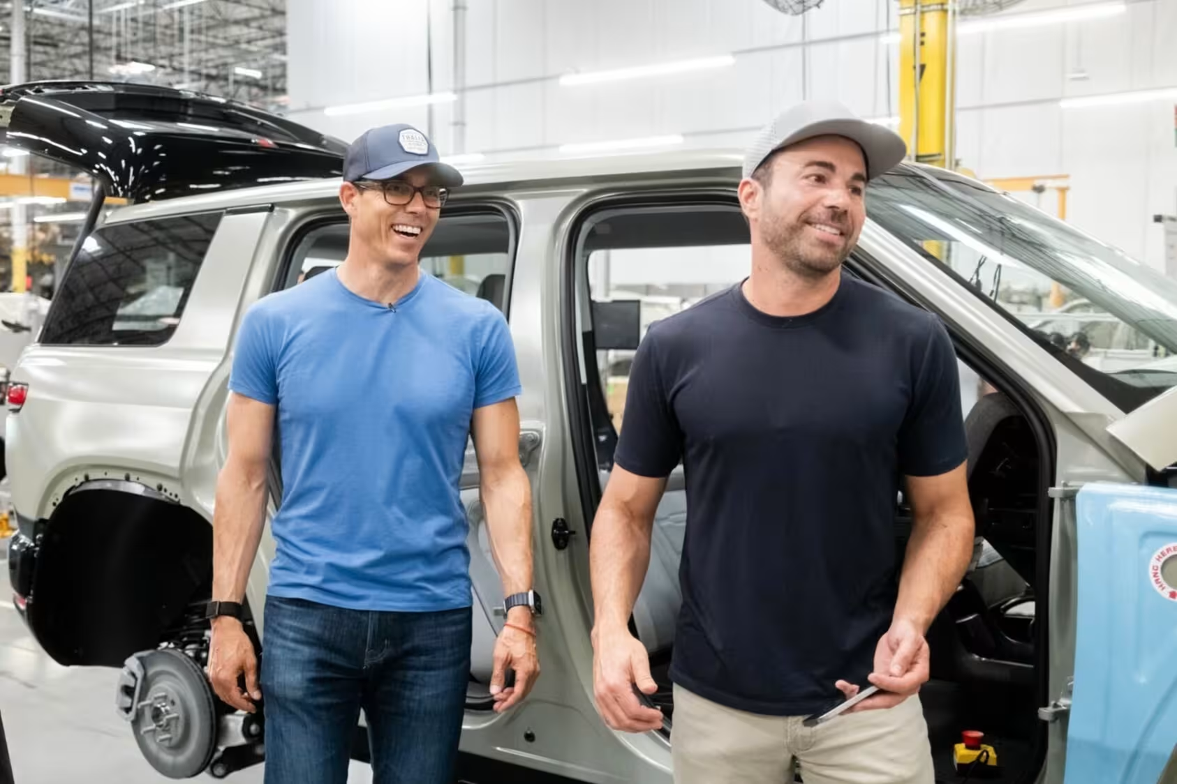 Rivian CEO RJ Scaringe (left) and Mark Rober, former NASA engineer and YouTube creator.
