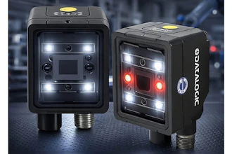 Two black industrial vision sensors with LED lighting arrays and metal connectors displayed against urban background
