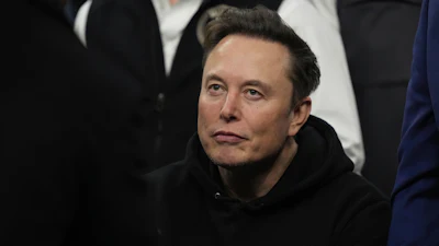 Elon Musk attends the finals for the NCAA wrestling championship, March 22, 2025, in Philadelphia.