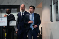 Sam Altman, right, and OpenAI president Greg Brockman, center, arrive at the U.S. District Court in Oakland, Calif., Thursday, April 30, 2026.