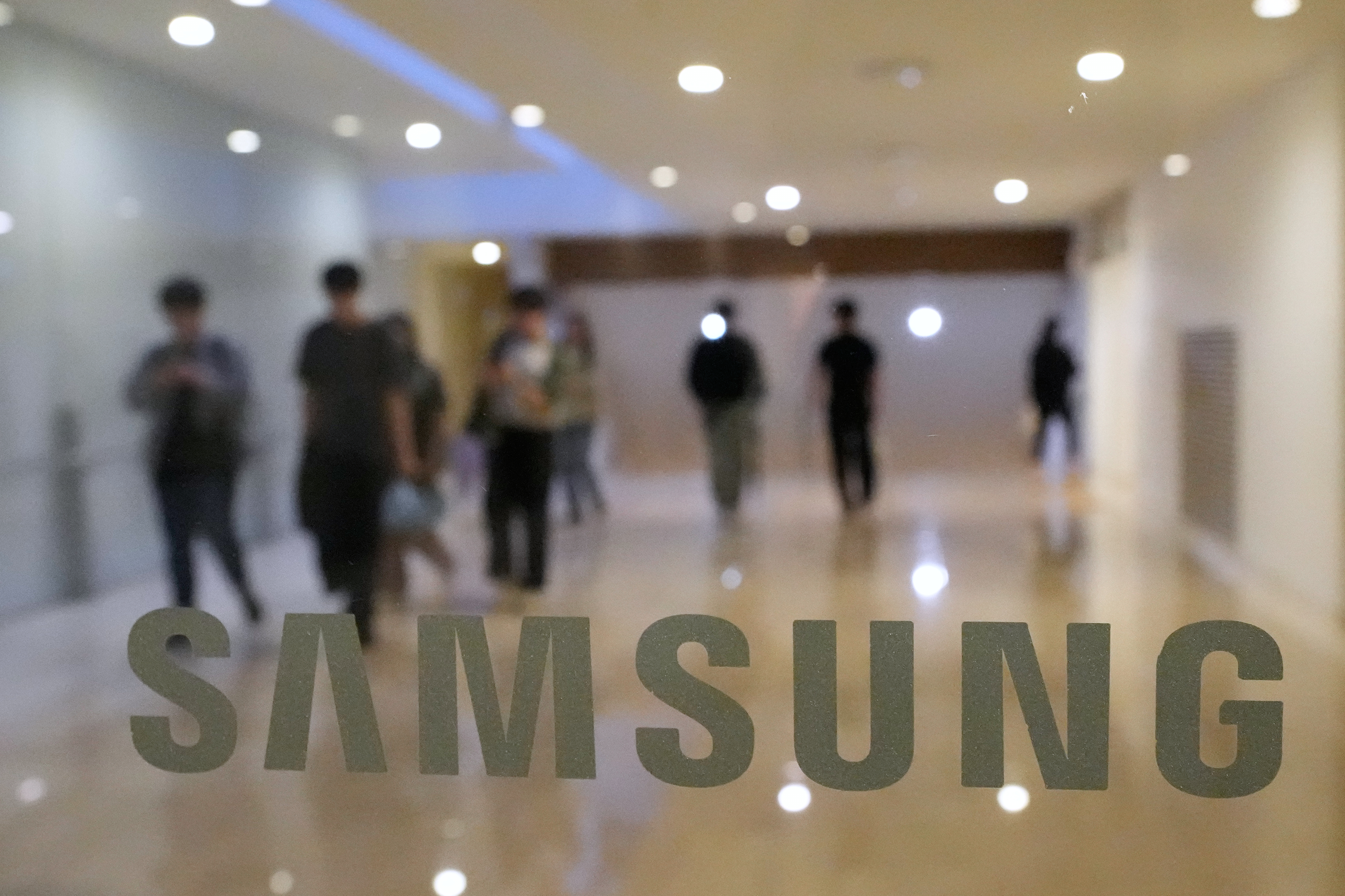 The logo of the Samsung Electronics Co. is seen at its office in Seoul, South Korea, Wednesday, May 20, 2026.