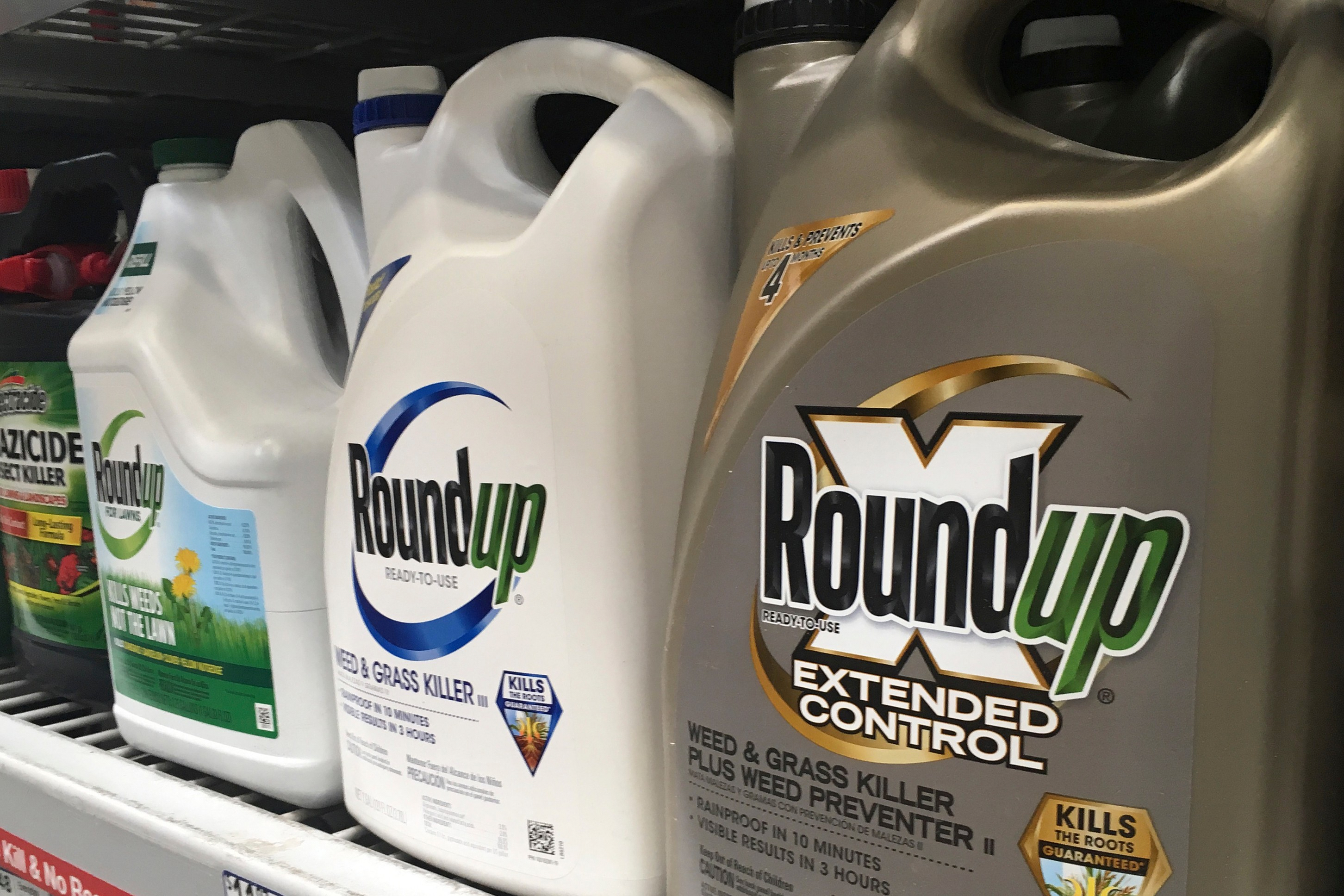 Containers of Roundup are displayed on a store shelf in San Francisco, Feb. 24, 2019.