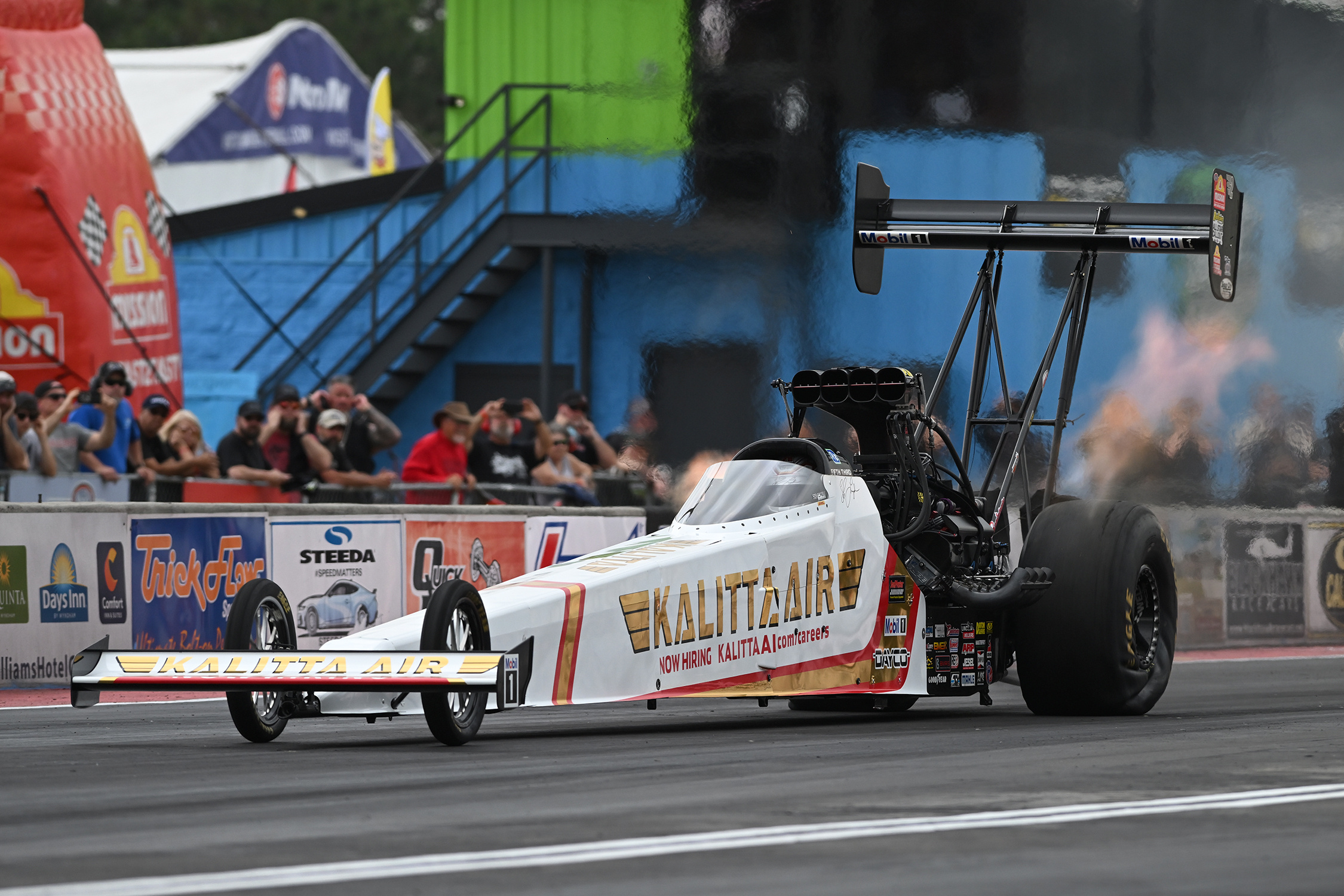 In this photo provided by the NHRA, Top Fuel's Shawn Langdon sets a new NHRA speed record Friday, May 1, 2026, at the NHRA Southern Nationals drag races at South Georgia Motorsports Park in Adel, Ga.