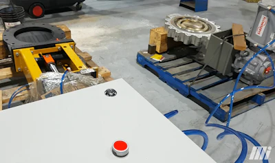 Figure 1. The testing area where the engineers validated that the knife gate valve and the butterfly valve can be exclusively operated. Shown is the touch panel with the push button that operates the knife gate valve.